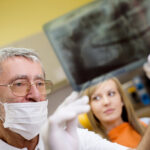 dentist showing patient their xray