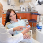 Woman patient at dentist consultation in orthodontic clinic
